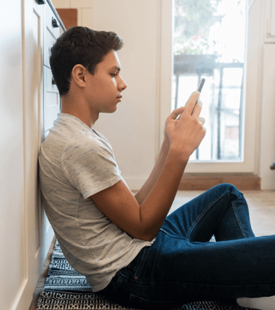 teen using phone