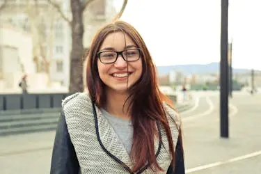 Smiling teenager wearing glasses 
